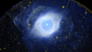 Astronomers have long been studying the universe to understand its mysteries. One of the ways they do this is by using the light from distant stars, such as the Helix Nebula, to measure the apparent expansion of the universe. This method has led to various groundbreaking discoveries that have challenged our understanding of the cosmos. (Image credit: NASA/JPL-Caltech/SSC)